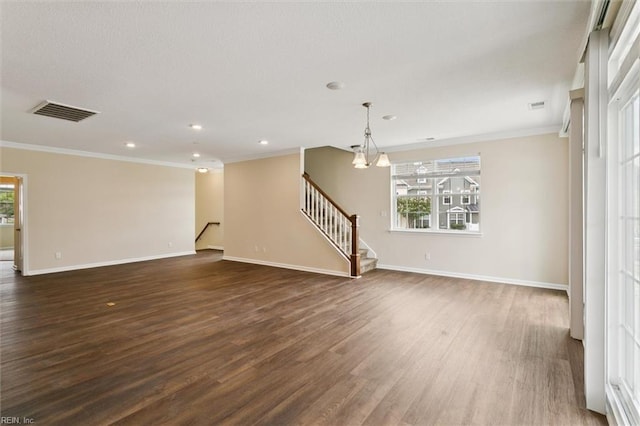 1402 Farringdon Way, Williamsburg, VA 23185 - unfurnished living room featuring crown molding, stairs, dark wood-style floors, recessed lighting, and a chandelier