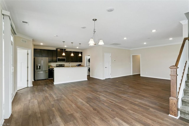 1402 Farringdon Way, Williamsburg, VA 23185 - unfurnished living room with dark wood-type flooring, stairway, recessed lighting, ornamental molding, and estacked washer and dryer