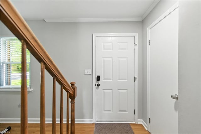 1217 Etworth Ln, Virginia Beach, VA 23464 - entryway featuring ornamental molding, plenty of natural light, light wood finished floors, and stairs