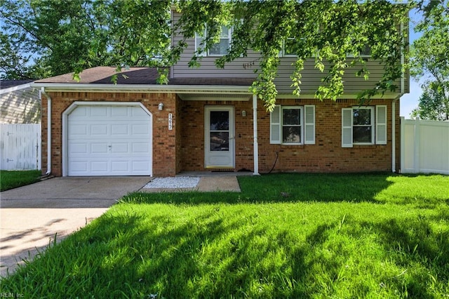 1217 Etworth Ln, Virginia Beach, VA 23464 - view of front facade featuring driveway, an attached garage, and brick siding