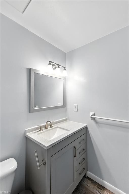 1217 Etworth Ln, Virginia Beach, VA 23464 - half bathroom featuring vanity and wood finished floors