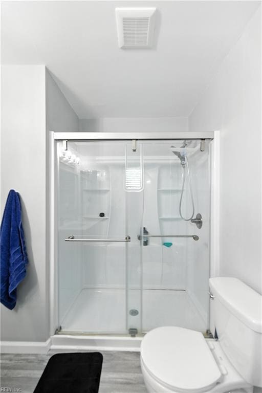 1217 Etworth Ln, Virginia Beach, VA 23464 - bathroom with a stall shower and wood finished floors