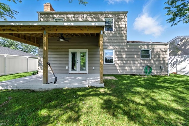 1217 Etworth Ln, Virginia Beach, VA 23464 - rear view of property with a ceiling fan, a patio area, and a chimney