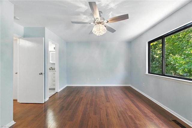 233 Mill Point Dr, Hampton, VA 23669 - unfurnished room with dark wood finished floors, a ceiling fan, and a smoke detector