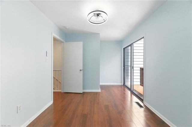 233 Mill Point Dr, Hampton, VA 23669 - empty room with wood finished floors and baseboards