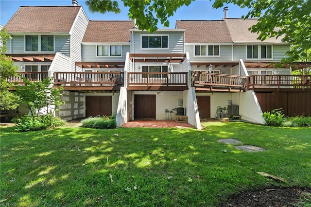 233 Mill Point Dr, Hampton, VA 23669 - rear view of house featuring a deck and a lawn