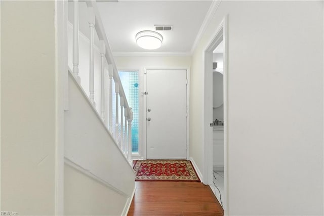 233 Mill Point Dr, Hampton, VA 23669 - doorway featuring wood finished floors and ornamental molding