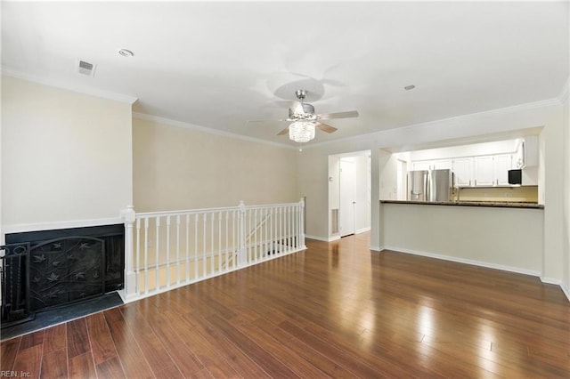233 Mill Point Dr, Hampton, VA 23669 - unfurnished living room with a ceiling fan, crown molding, dark wood-style flooring, and a fireplace