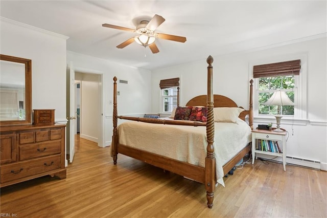 11 Elm Ave, Newport News, VA 23601 - bedroom with light wood-type flooring, a ceiling fan, and crown molding