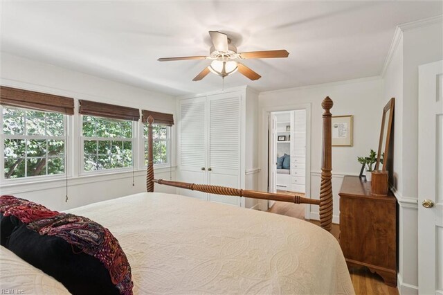 11 Elm Ave, Newport News, VA 23601 - bedroom featuring wood finished floors, crown molding, a ceiling fan, and a closet