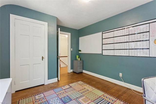 11 Elm Ave, Newport News, VA 23601 - unfurnished bedroom with wood finished floors and baseboards