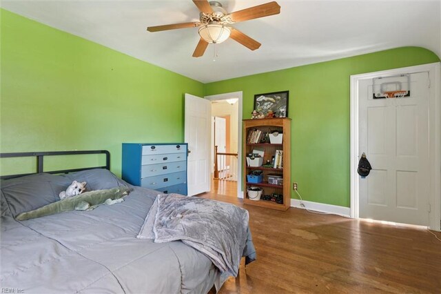 11 Elm Ave, Newport News, VA 23601 - bedroom with wood finished floors and a ceiling fan