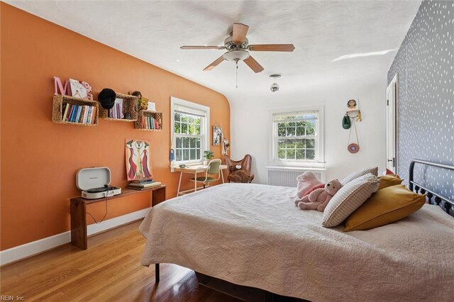 11 Elm Ave, Newport News, VA 23601 - bedroom with wood finished floors and ceiling fan