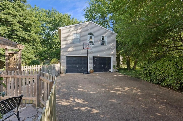 11 Elm Ave, Newport News, VA 23601 - view of side of home featuring driveway and a garage