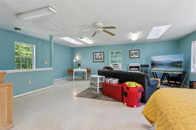 11 Elm Ave, Newport News, VA 23601 - living room with plenty of natural light, tile patterned floors, cooling unit, and a ceiling fan