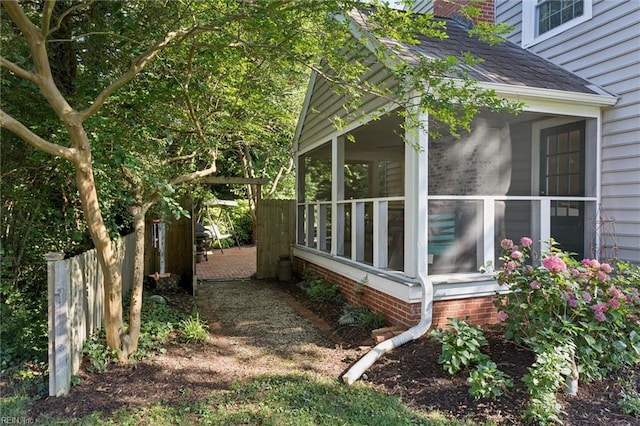 11 Elm Ave, Newport News, VA 23601 - view of side of property featuring a sunroom and a shingled roof