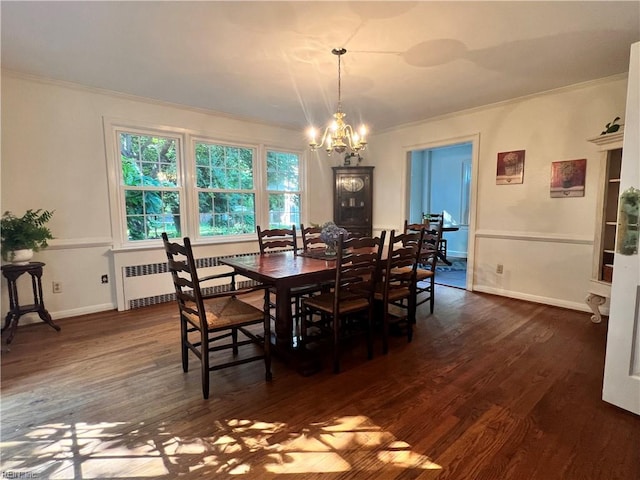 11 Elm Ave, Newport News, VA 23601 - dining area with radiator heating unit, a chandelier, dark wood finished floors, and crown molding