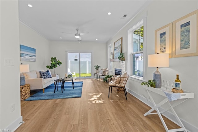 516 26th St, Virginia Beach, VA 23451 - sitting room with ornamental molding, light wood-type flooring, plenty of natural light, ceiling fan, and recessed lighting