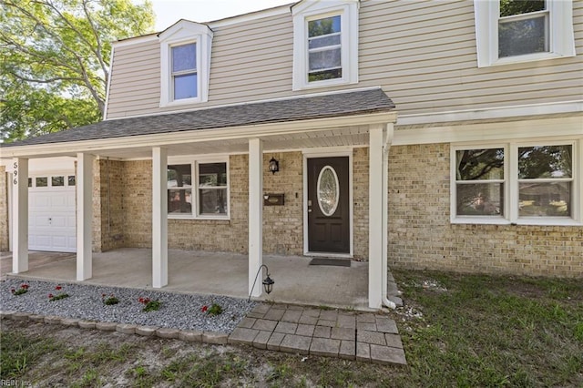 596 Old Post Rd, Virginia Beach, VA 23452 - entrance to property with a porch and brick siding
