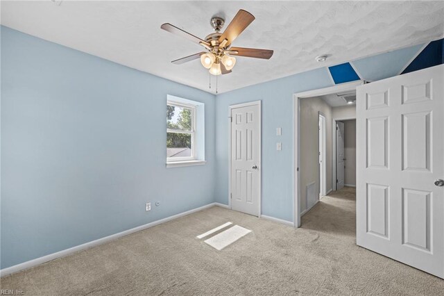 596 Old Post Rd, Virginia Beach, VA 23452 - unfurnished bedroom featuring carpet floors, a closet, and a ceiling fan