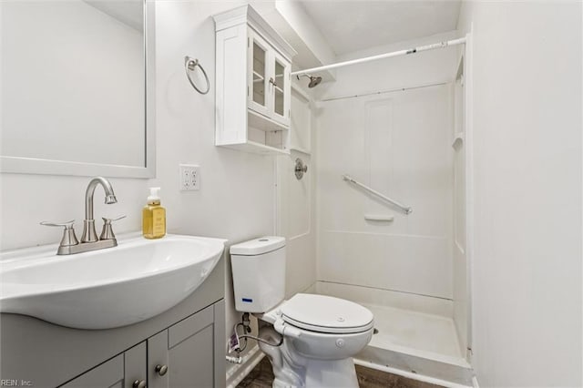 1521 Peabody Dr, Hampton, VA 23666 - bathroom featuring a shower, vanity, and wood finished floors