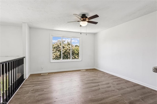 1521 Peabody Dr, Hampton, VA 23666 - unfurnished room featuring wood finished floors, ceiling fan, and a textured ceiling
