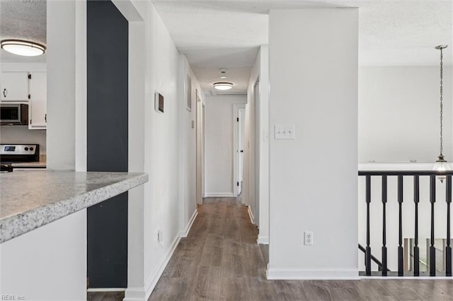 1521 Peabody Dr, Hampton, VA 23666 - hall featuring wood finished floors and a textured ceiling