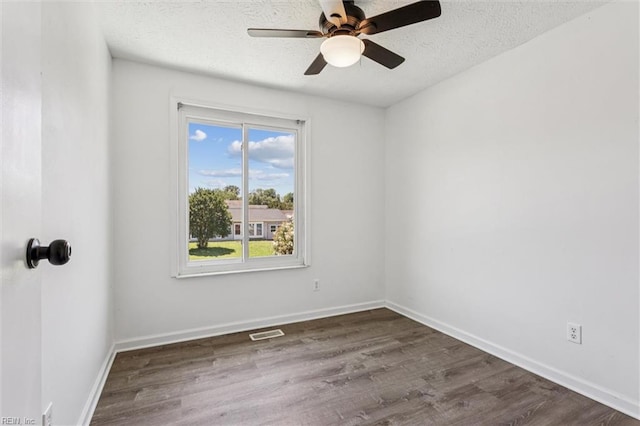 1521 Peabody Dr, Hampton, VA 23666 - empty room with ceiling fan, dark wood-style floors, and a textured ceiling