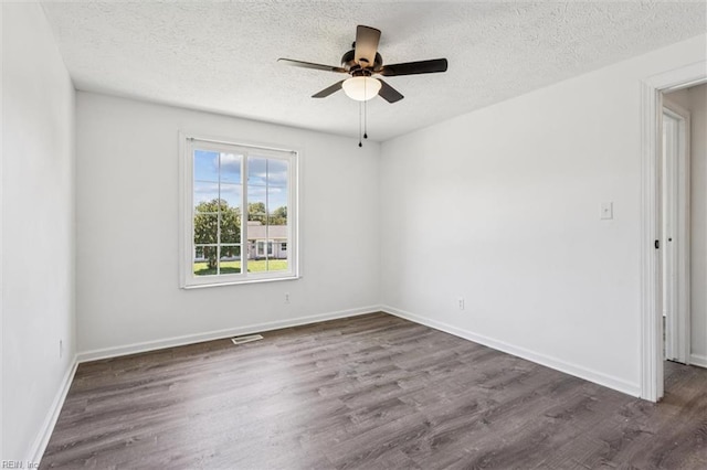 1521 Peabody Dr, Hampton, VA 23666 - empty room with ceiling fan, dark wood finished floors, and a textured ceiling