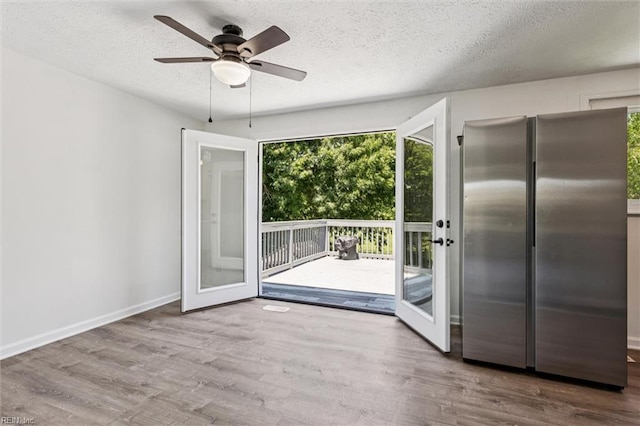 1521 Peabody Dr, Hampton, VA 23666 - doorway featuring french doors, wood finished floors, a ceiling fan, and a textured ceiling