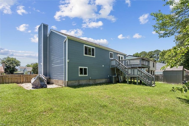 1521 Peabody Dr, Hampton, VA 23666 - back of house with stairs, a chimney, and a deck