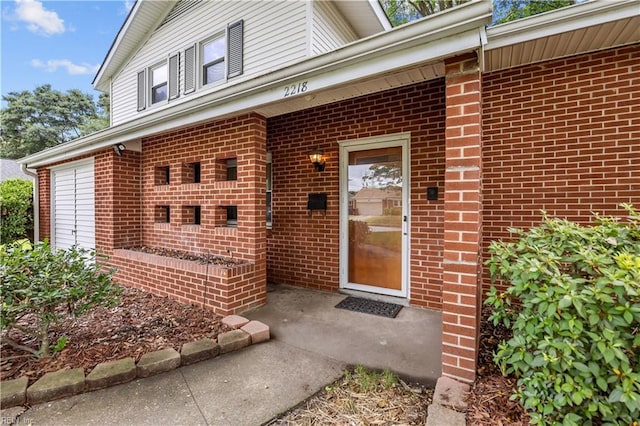 2218 Haywood Ave, Chesapeake, VA 23324 - doorway to property featuring brick siding