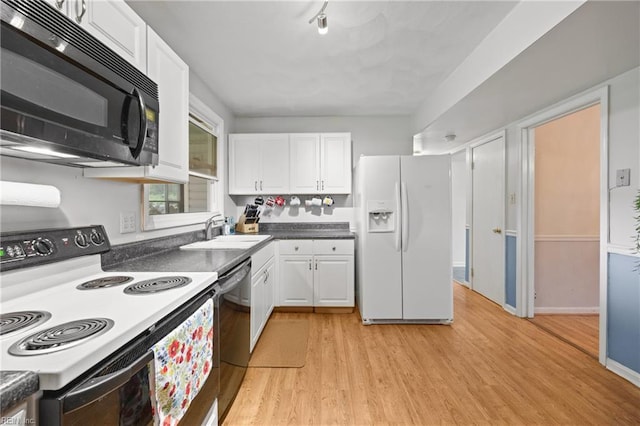 16 Diggs Dr, Hampton, VA 23666 - kitchen featuring black microwave, electric range oven, white refrigerator with ice dispenser, white cabinets, and dishwasher