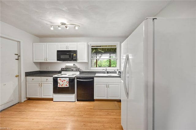 16 Diggs Dr, Hampton, VA 23666 - kitchen with black appliances, white cabinetry, light wood-type flooring, and dark countertops
