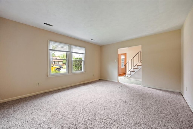 16 Diggs Dr, Hampton, VA 23666 - empty room featuring light colored carpet and stairway