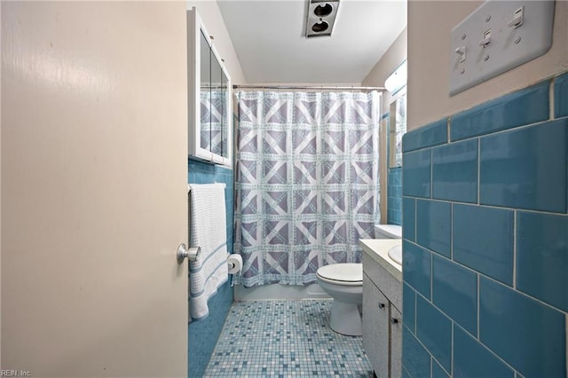 16 Diggs Dr, Hampton, VA 23666 - bathroom featuring tile patterned flooring, tile walls, and vanity
