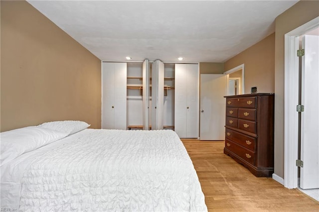 16 Diggs Dr, Hampton, VA 23666 - bedroom with multiple closets, light wood-type flooring, and recessed lighting