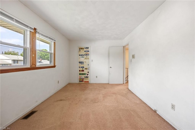 16 Diggs Dr, Hampton, VA 23666 - spare room featuring light colored carpet