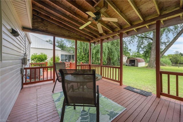 16 Diggs Dr, Hampton, VA 23666 - deck featuring a ceiling fan, a yard, outdoor dining space, and a storage shed