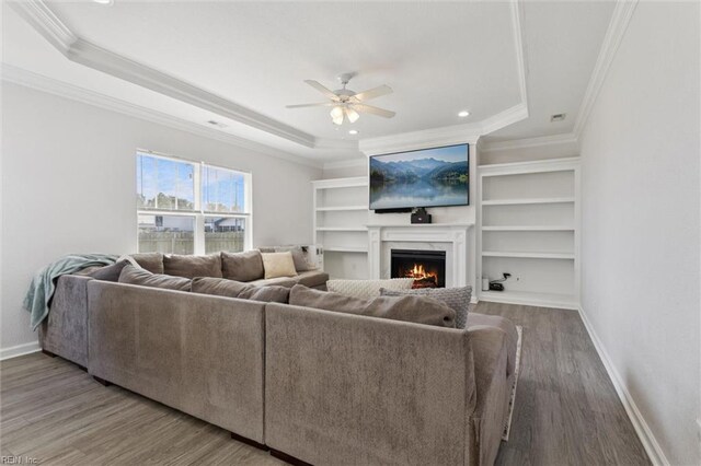 208 Parkdale Ave, Hampton, VA 23669 - living room featuring ornamental molding, a lit fireplace, ceiling fan, wood finished floors, and a raised ceiling