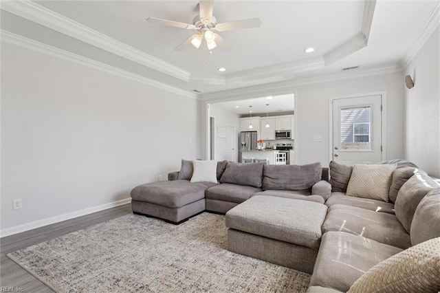 208 Parkdale Ave, Hampton, VA 23669 - living area with wood finished floors, ceiling fan, a tray ceiling, crown molding, and recessed lighting
