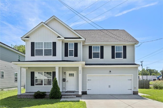 208 Parkdale Ave, Hampton, VA 23669 - view of front of property with board and batten siding, driveway, an attached garage, a porch, and a front lawn