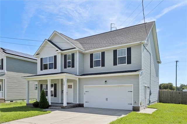 208 Parkdale Ave, Hampton, VA 23669 - view of front facade with covered porch, driveway, an attached garage, and board and batten siding