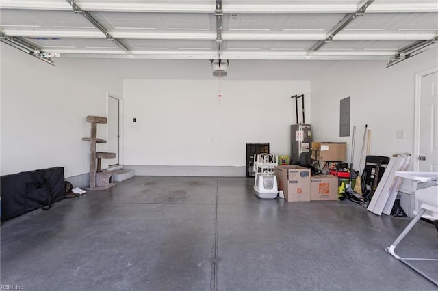 208 Parkdale Ave, Hampton, VA 23669 - garage featuring electric water heater, electric panel, and a garage door opener