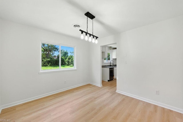 3144 Aaron Dr, Chesapeake, VA 23323 - unfurnished room featuring light wood-style floors and a sink