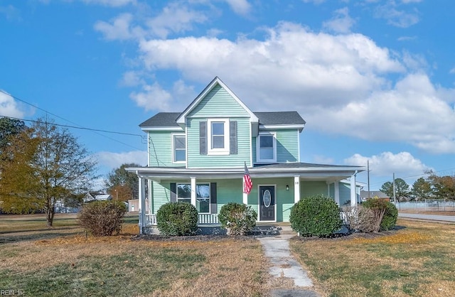 10 Church St, Windsor, VA 23487 - view of front facade featuring a porch and a front lawn