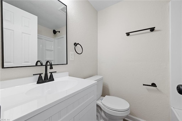10 Church St, Windsor, VA 23487 - full bathroom featuring vanity and a textured wall