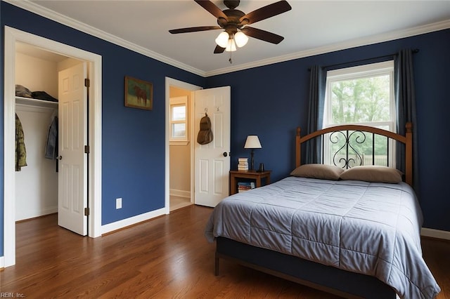 4225 Terry Dr, Chesapeake, VA 23321 - bedroom with wood finished floors, ornamental molding, a closet, a ceiling fan, and a spacious closet