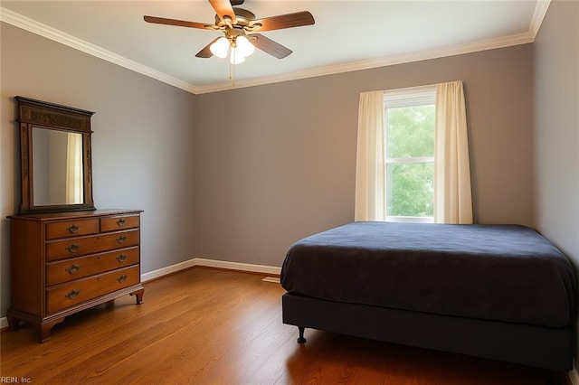 4225 Terry Dr, Chesapeake, VA 23321 - bedroom with wood finished floors, crown molding, and a ceiling fan