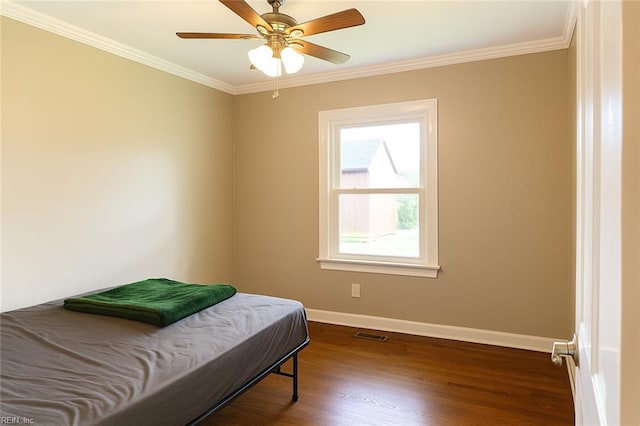 4225 Terry Dr, Chesapeake, VA 23321 - bedroom with dark wood-type flooring, ornamental molding, and a ceiling fan